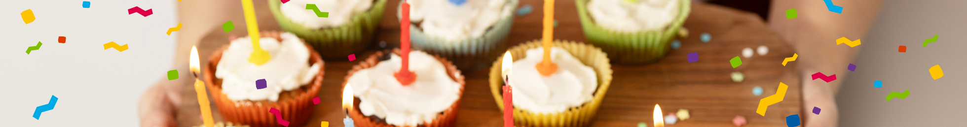 Foto: Sarah Wiener Stiftung Bunte Muffins mit Kerzen