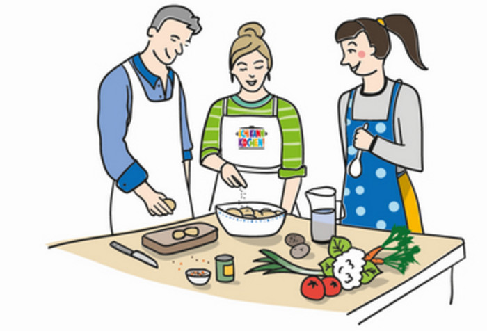 Genussbotschfater:innen bereiten gemeinsam im Rahmen einer Ich kann kochen!-Fortbildung eine Mahlzeit zu.